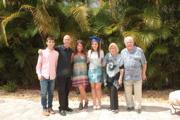 Barry, second from the left, celebrating his daughter's graduation in May, 2015.