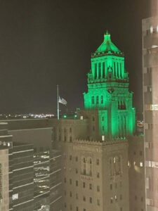 Mayo Clinic's Plummer Building lit green in honor of Dave's visit.